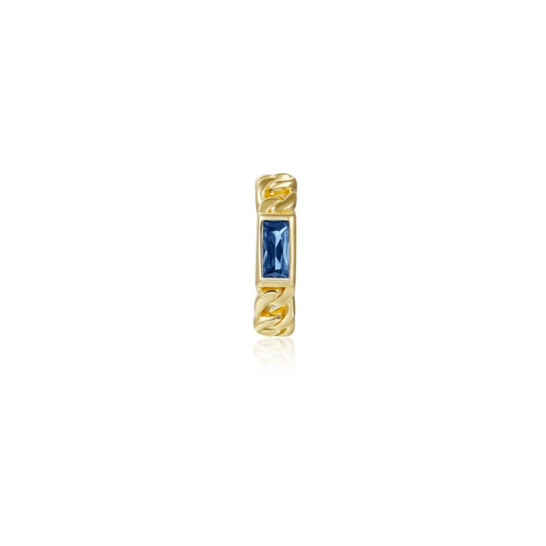 Zlatý ear cuff s modrými zirkony