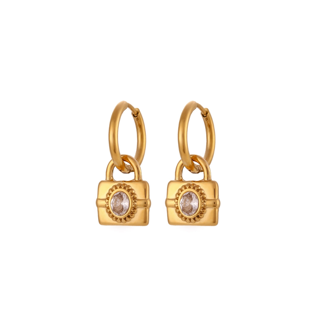 Gold earrings with zircons