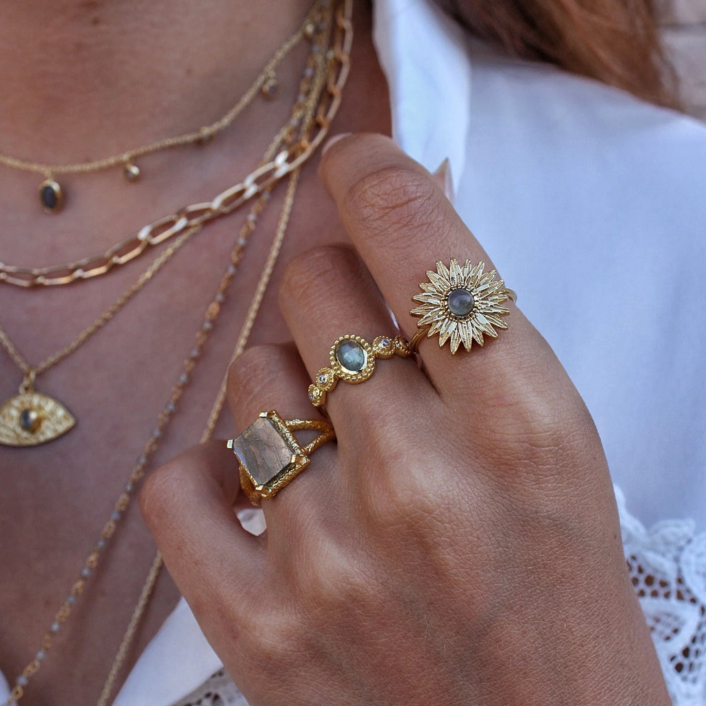 Baroque gold ring with stone and zircons